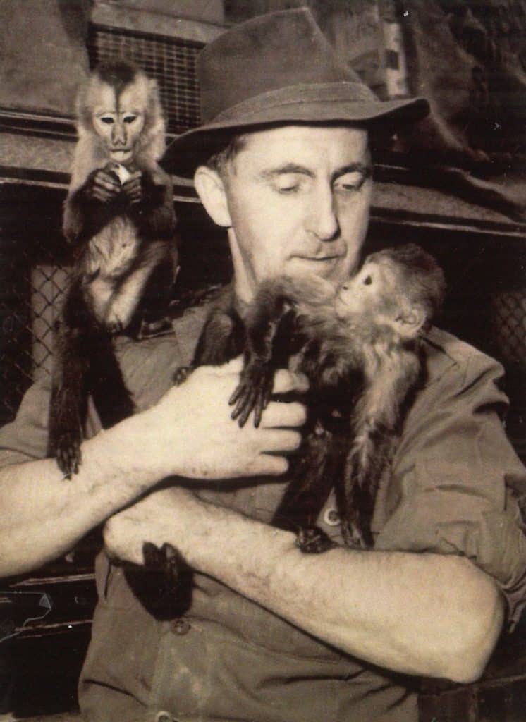 ken smith holding baby monkeys